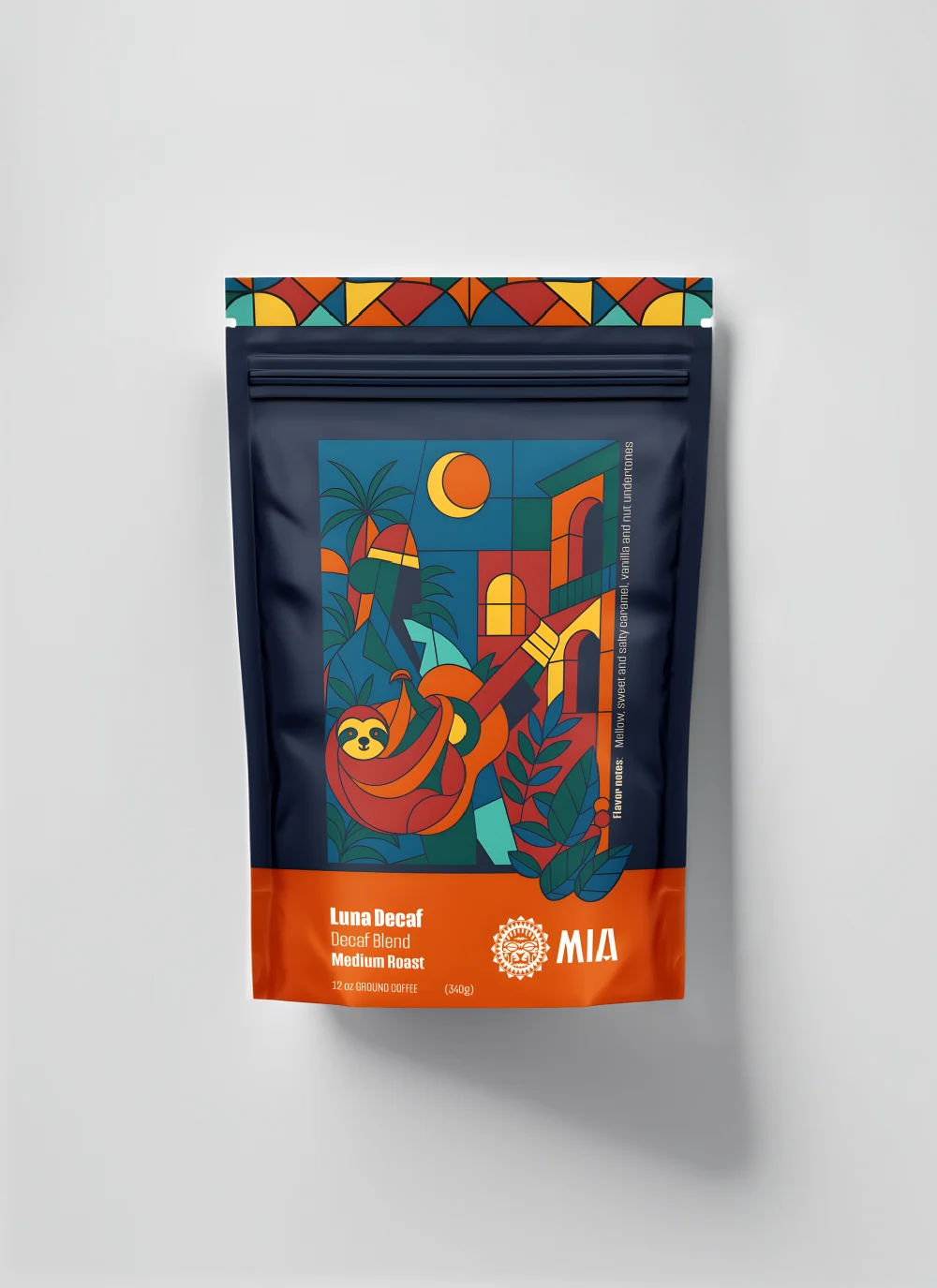 Mia Luna Decaf coffee bag — navy pouch with an illustrated tropical night scene and orange base band